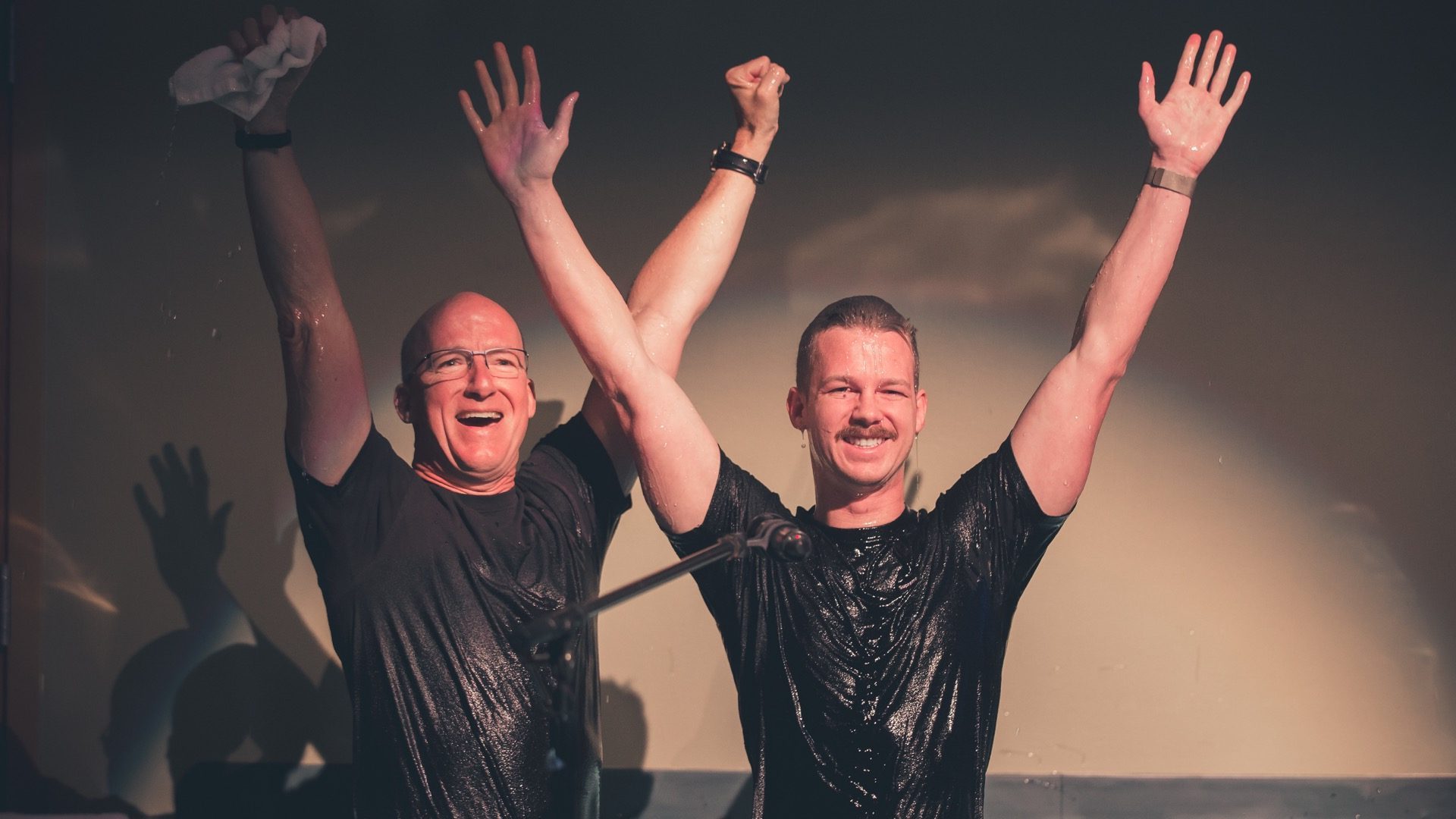 Pastor Brad Bigney baptizing Harrison
