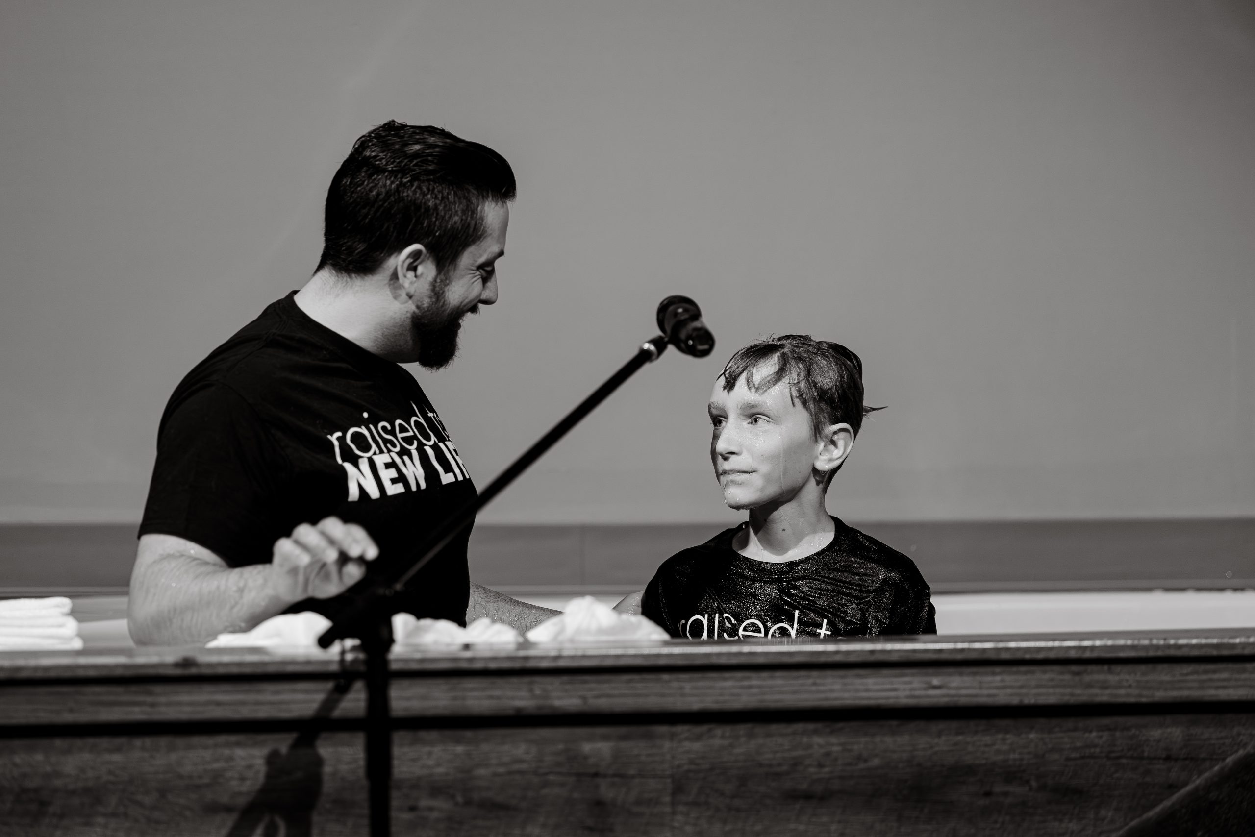 A student worshiping with the group