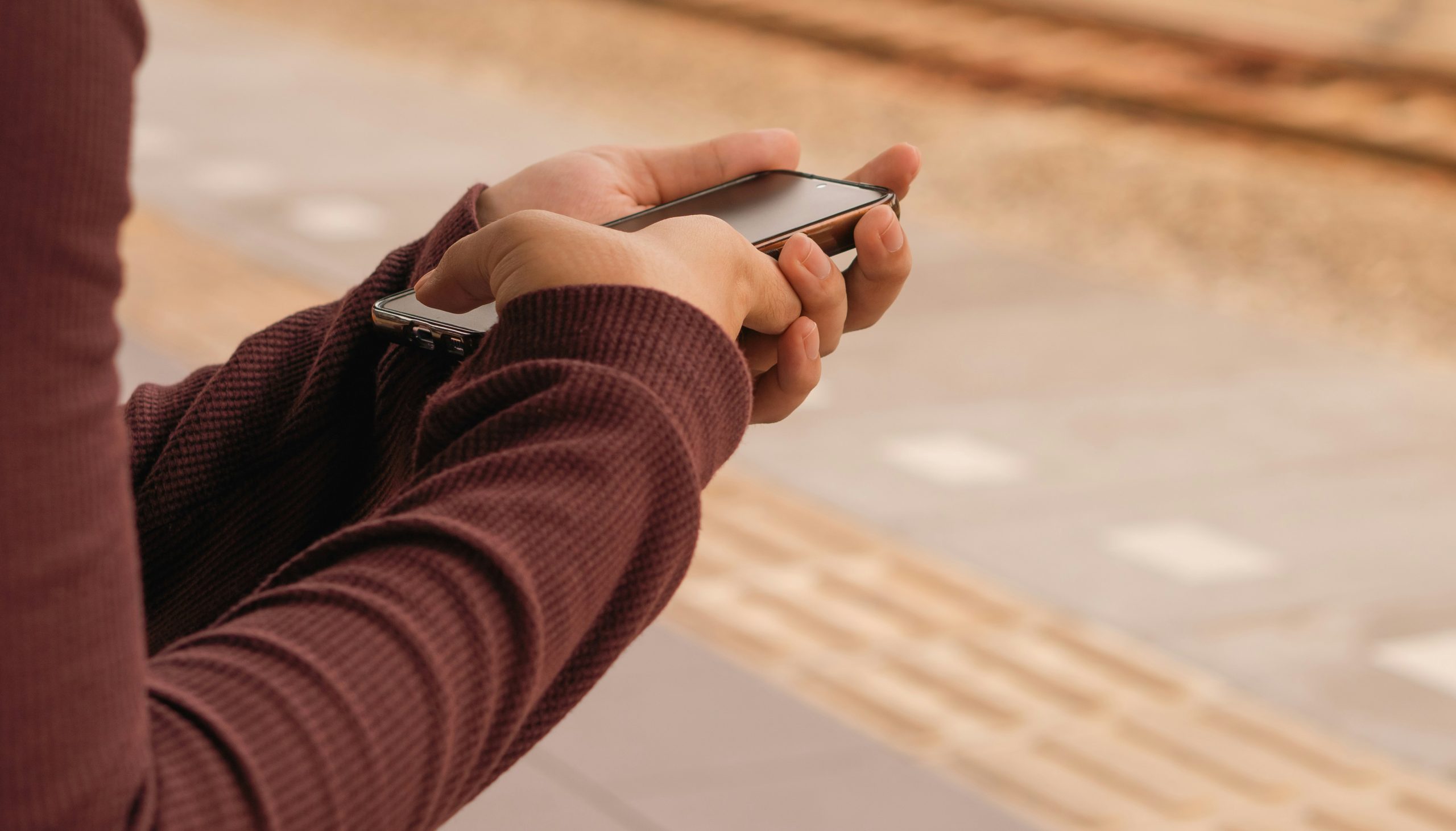 Person holding a phone
